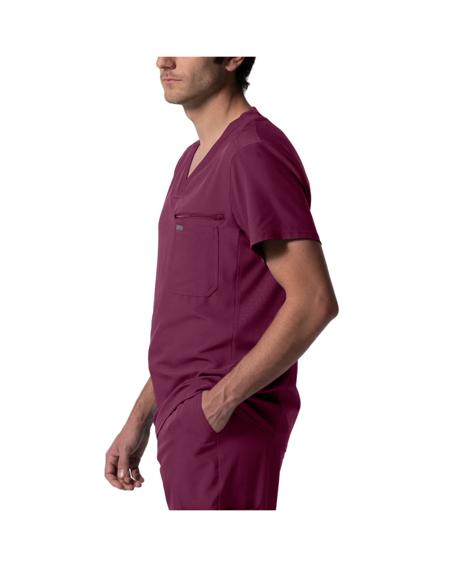 Haut à col en V pout homme, panneaux côtelés au dos, Avec 2 poches, 1 poche poitrine, une boucle pour badge d'identification et une poche zippée bonus.