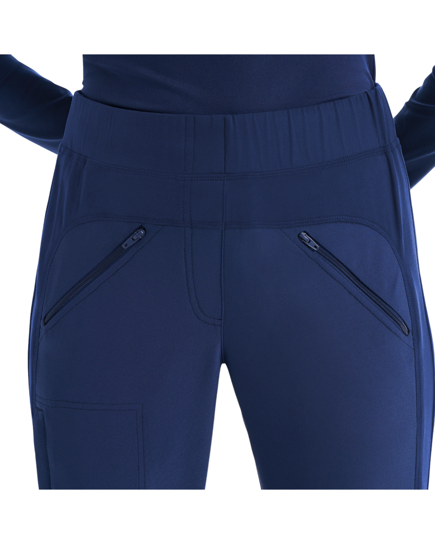 Vue avant poches à ferneture éclair Pantalon d'uniforme jambes évasées style ''bootcut'' pour femme White Cross CRFT #WB414 couleur Marine
