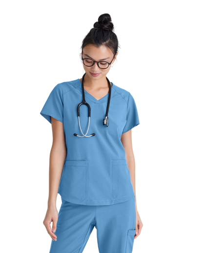 Haut à col en V et passepoil à deux poches Grey's Anatomy Evolve #GSST180