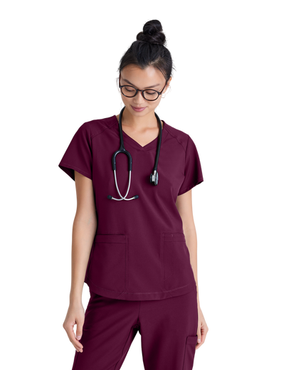 Haut à col en V et passepoil à deux poches Grey's Anatomy Evolve #GSST180