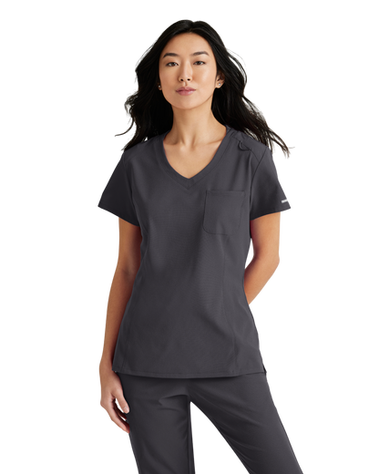 Haut d'uniforme dame à une poche Dignity à rentrer dans le pantalon Skechers™ by BarcoSKECHERS SKT147