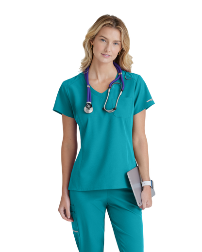 Haut d'uniforme dame à une poche Dignity à rentrer dans le pantalon Skechers™ by BarcoSKECHERS SKT147