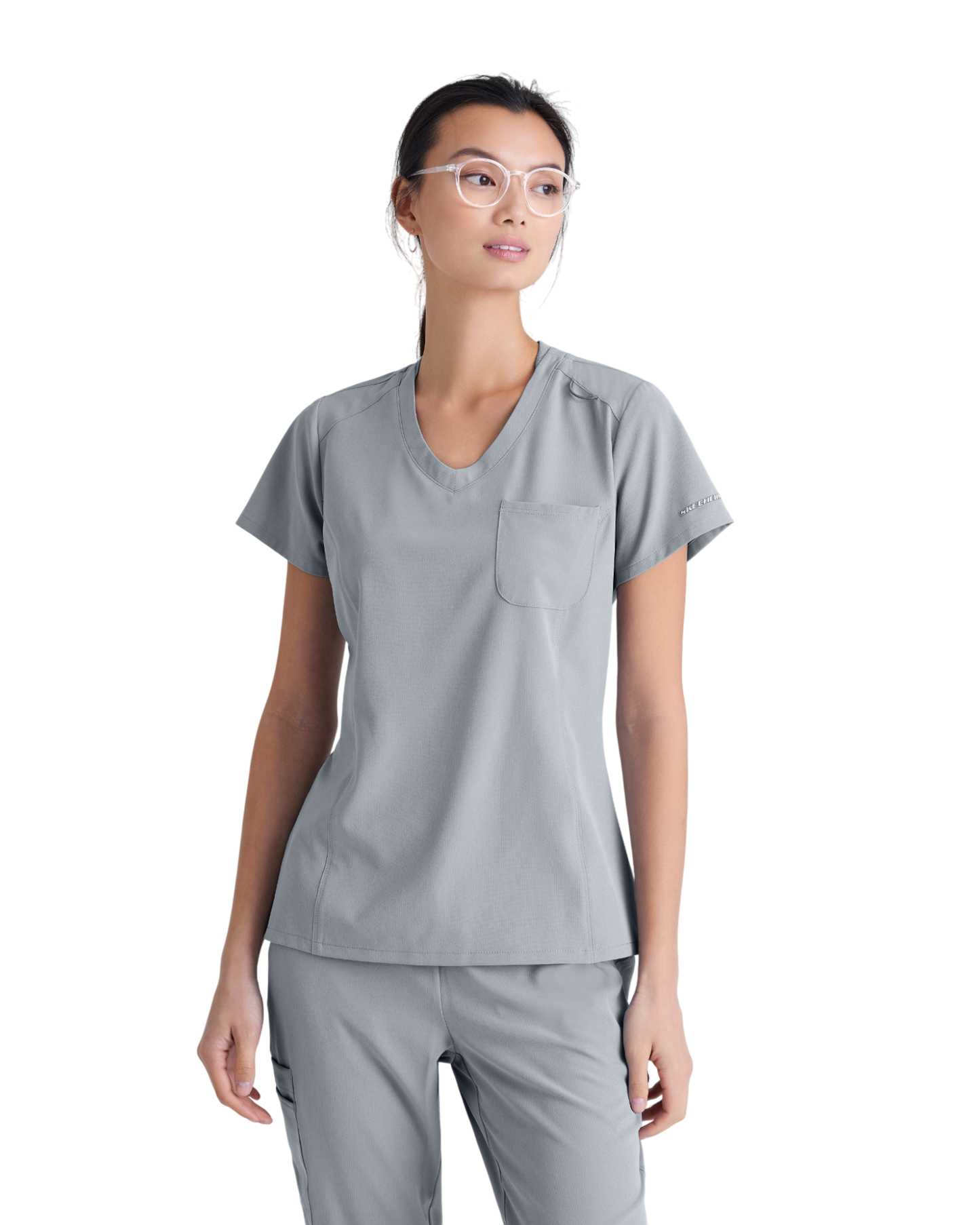 Haut d'uniforme dame à une poche Dignity à rentrer dans le pantalon Skechers™ by BarcoSKECHERS SKT147