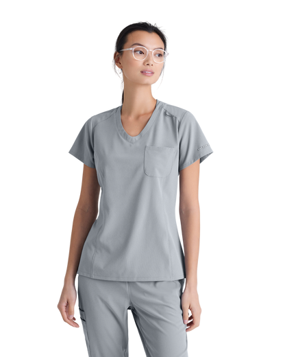 Haut d'uniforme dame à une poche Dignity à rentrer dans le pantalon Skechers™ by BarcoSKECHERS SKT147